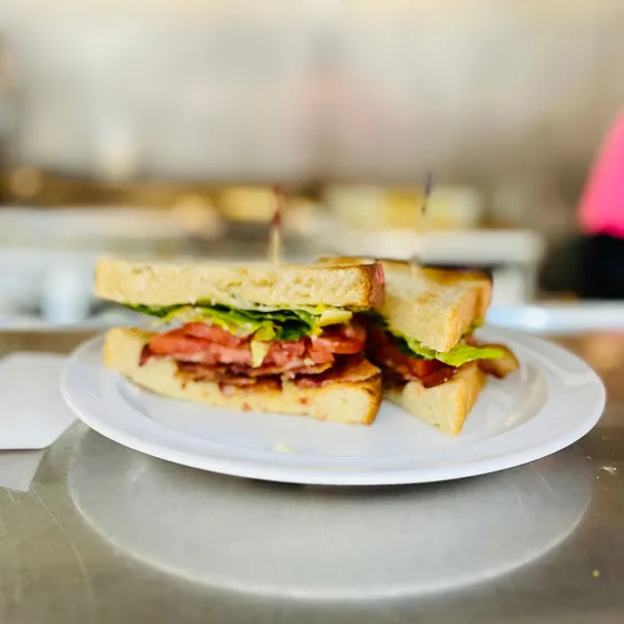 BLT on toasted bread, cut in half